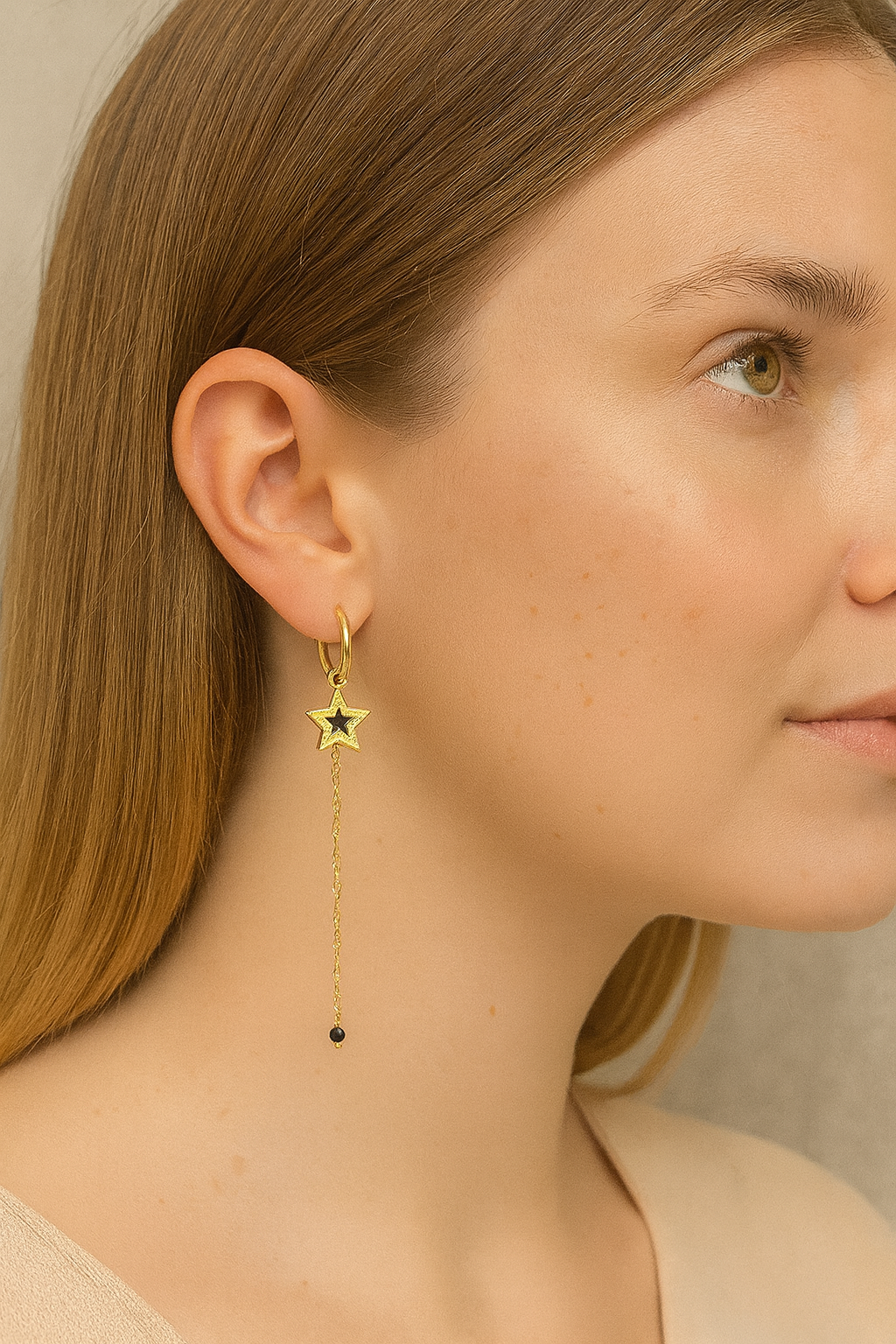 Stainless steel goudkleurige creolen met zwarte ster en ketting met kraal