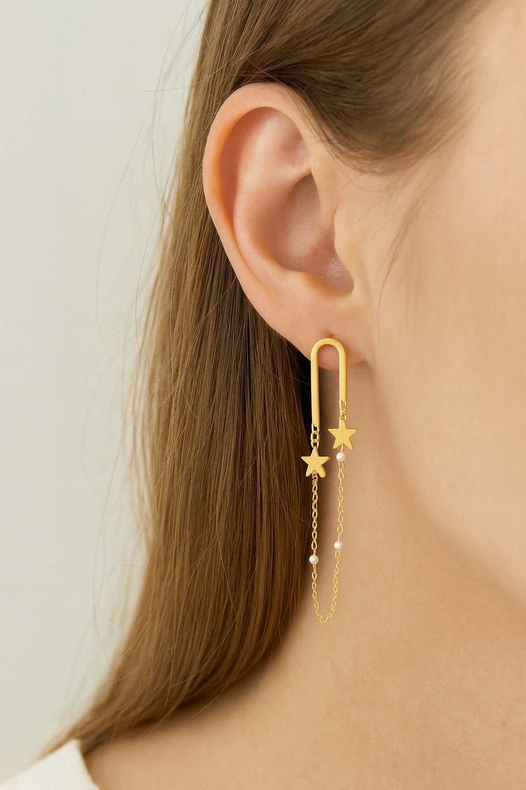 Stainless steel goudkleurige oorbellen met sterren_ketting en pareltjes