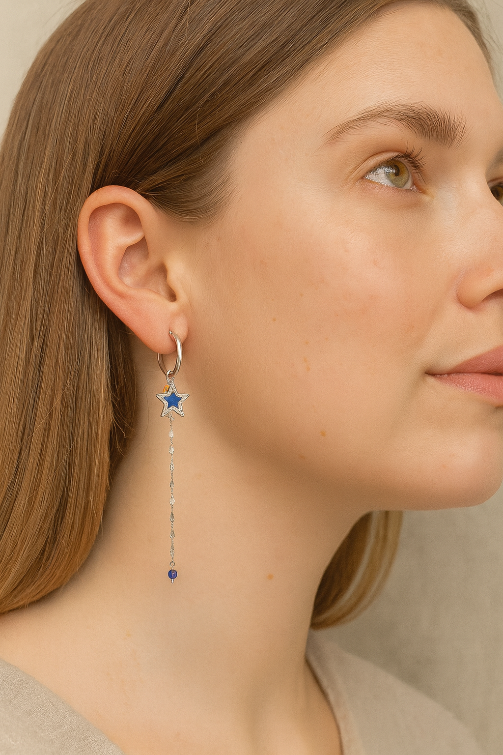 Stainless steel zilverkleurige creolen met blauwe ster en ketting met blauwe kraal