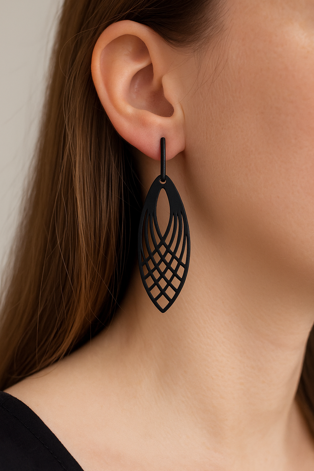 Zwarte staafjes met zwarte oog hangers