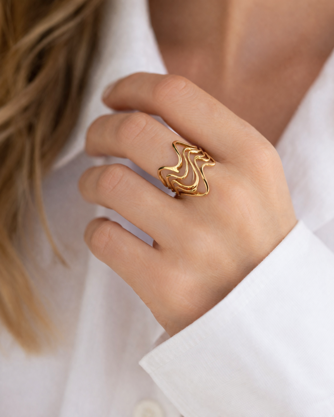 Goudkleurige golven ring (stainless steel)