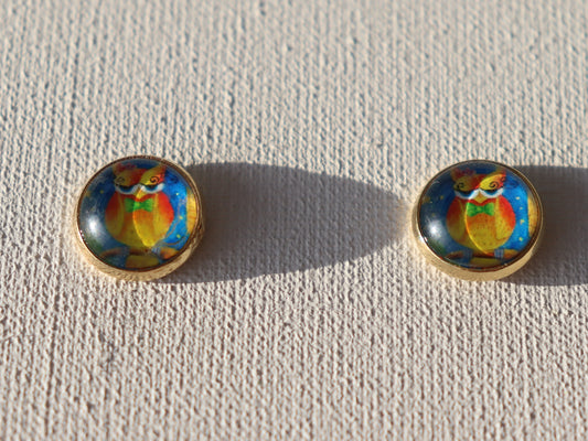 Goudkleurige oorstekers met geel,oranje uil