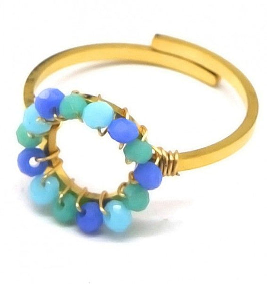 Stainless steel goudkleurige ring met blauweglaskralen
