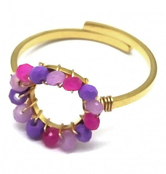 Stainlesss steel goudkleurige ring met paarse glaskralen