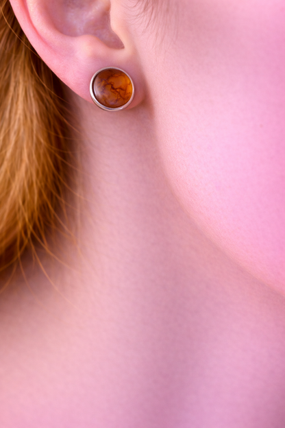 Zilverkleurige oorstekers met oranje boom ( chirurgisch roestvrij staal)