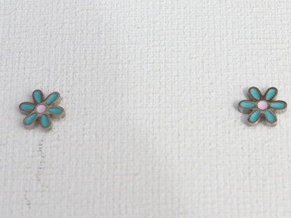 Zilverkleurige turquoise bloem oorbellen