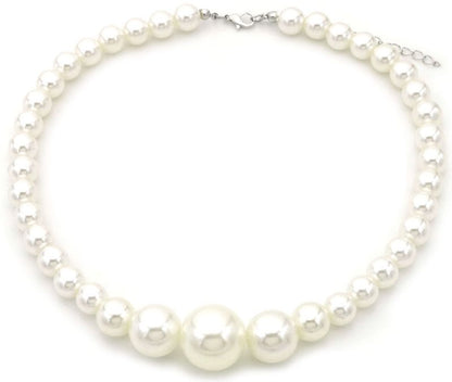 ketting met witte parels en extra grote parels